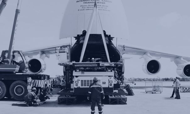loading cargo into airplane